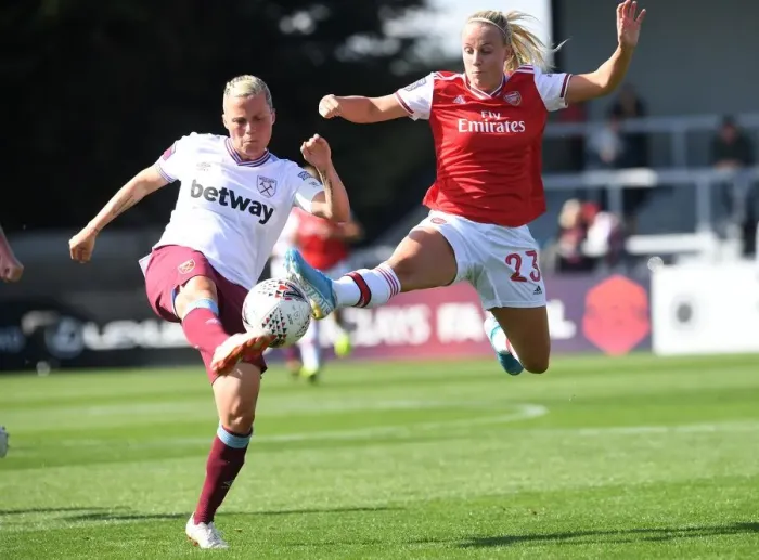 Framed Print : Intense Rivalry: Beth Mead vs. Gilly Flaherty - Arsenal Women vs. West Ham United Football Match