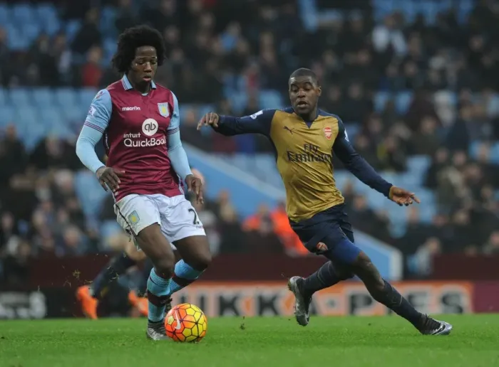 Framed Print : Intense Rivalry: Campbell vs Sanchez Showdown in Aston Villa vs Arsenal Premier League Clash