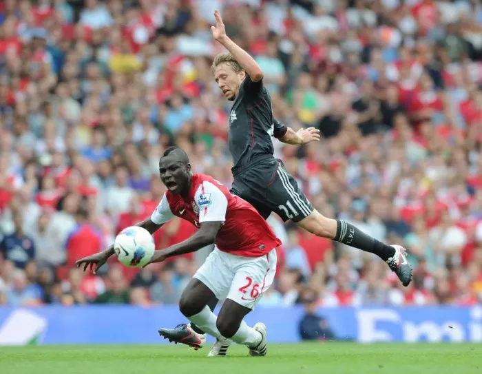 Framed Print : Intense Rivalry: Frimpong Fouls Lucas in Arsenal vs. Liverpool Clash