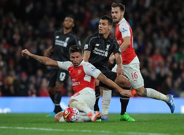 Intense Rivalry: Giroud vs. Lovren Clash in Arsenal vs. Liverpool Showdown