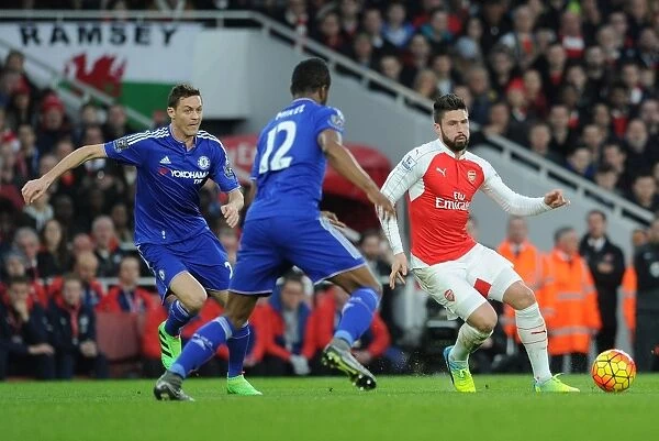 Intense Rivalry: Giroud vs Matic-Mikel - Arsenal vs Chelsea, Premier League 2015-16: A Battle at Emirates Stadium between Olivier Giroud and the Chelsea Duo