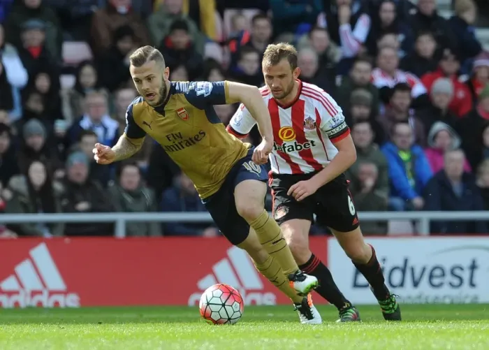 Framed Print : Intense Rivalry: Jack Wilshere vs. Lee Cattermole in Arsenal's Battle Against Sunderland