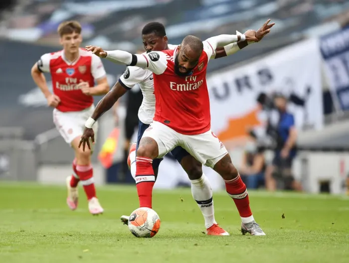 Framed Print : Intense Rivalry: Lacazette Fouls Aurier (2019-20) - Tottenham vs. Arsenal Framed Print : Intense Rivalry: Lacazette Fouls Aurier (2019-20) - Tottenham vs. Arsenal