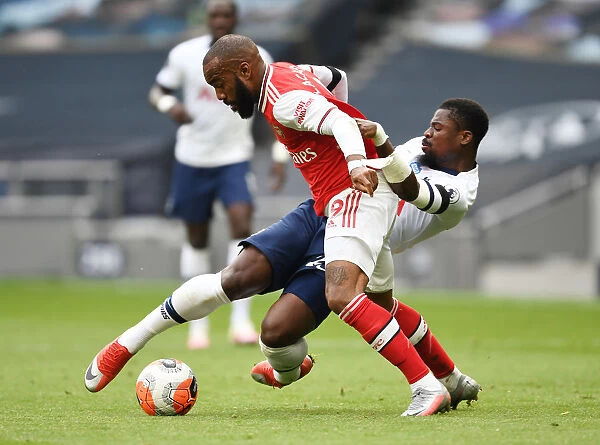 Intense Rivalry: Lacazette Fouls Aurier in Premier League Clash (Tottenham vs. Arsenal, 2019-20)