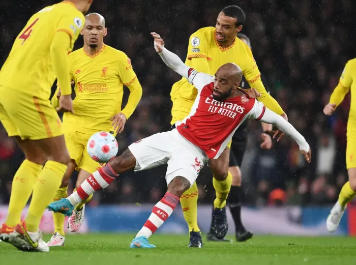 Framed Print : Intense Rivalry: Lacazette vs. Matip Battle in Arsenal vs. Liverpool Premier League Clash