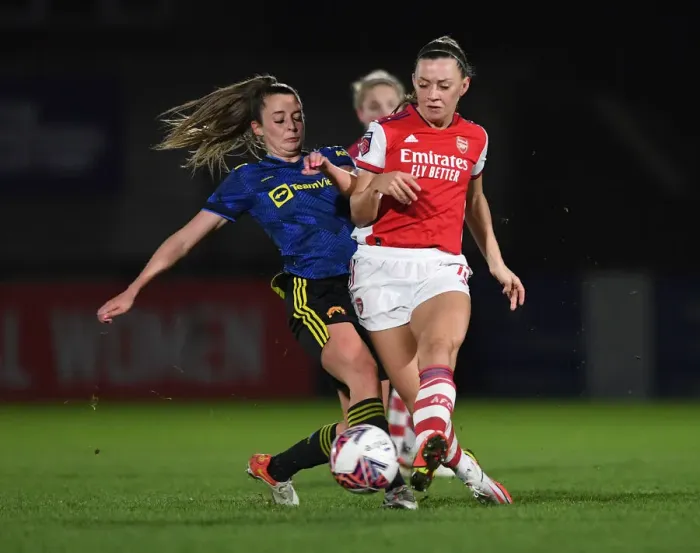 Framed Print : Intense Rivalry: McCabe vs Toone in Arsenal vs Manchester United FA Womens League Cup Quarterfinal