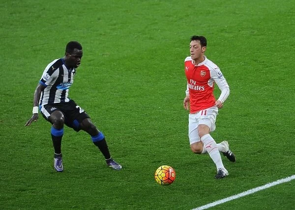 Intense Rivalry: Mesut Ozil vs. Cheick Tiote at Emirates Stadium (Arsenal vs. Newcastle United, 2015-16)