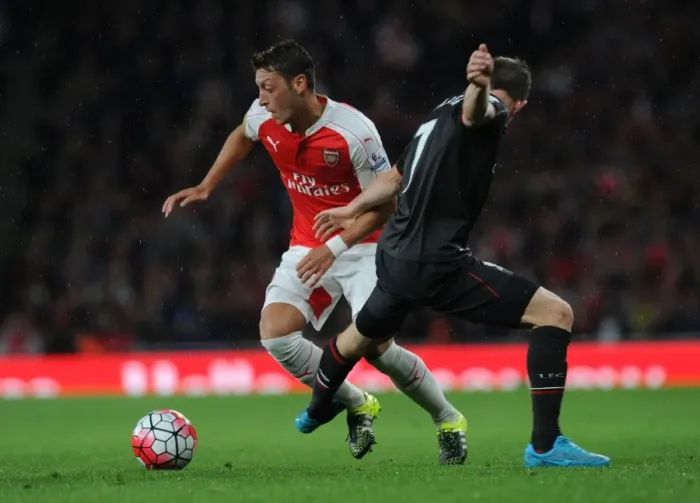 Framed Print : Intense Rivalry: Milner Trips Ozil in Arsenal vs. Liverpool Clash (2015 / 16) Framed Print : Intense Rivalry: Milner Trips Ozil in Arsenal vs. Liverpool Clash (2015 / 16)