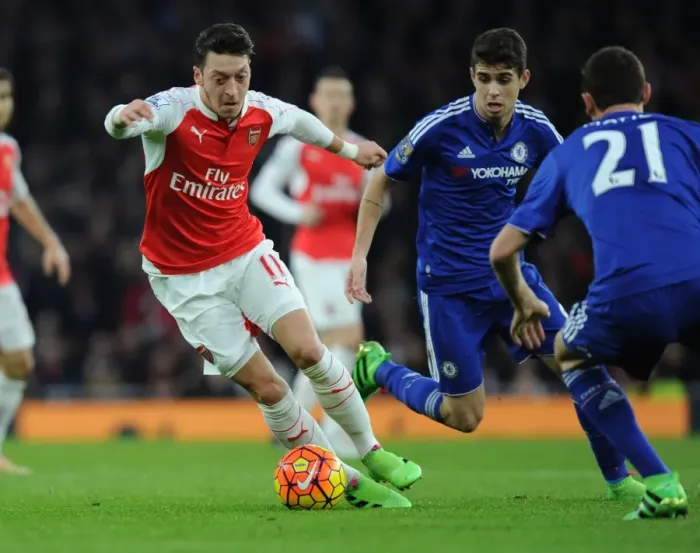 Framed Print : Intense Rivalry: Ozil vs. Matic & Oscar in Arsenal vs. Chelsea Clash