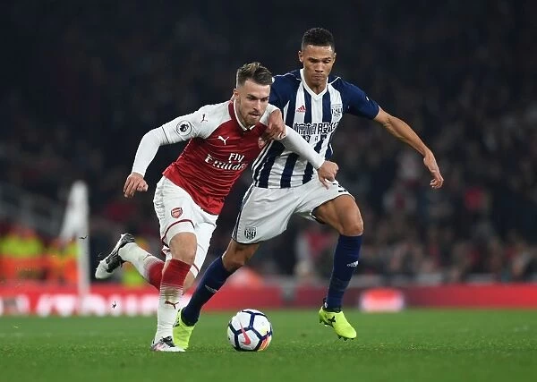 Intense Rivalry: Ramsey vs. Gibbs Clash at Arsenal