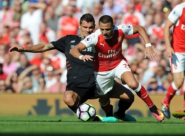 Intense Rivalry: Sanchez Fouls Lovren in Arsenal vs. Liverpool (2016-17)