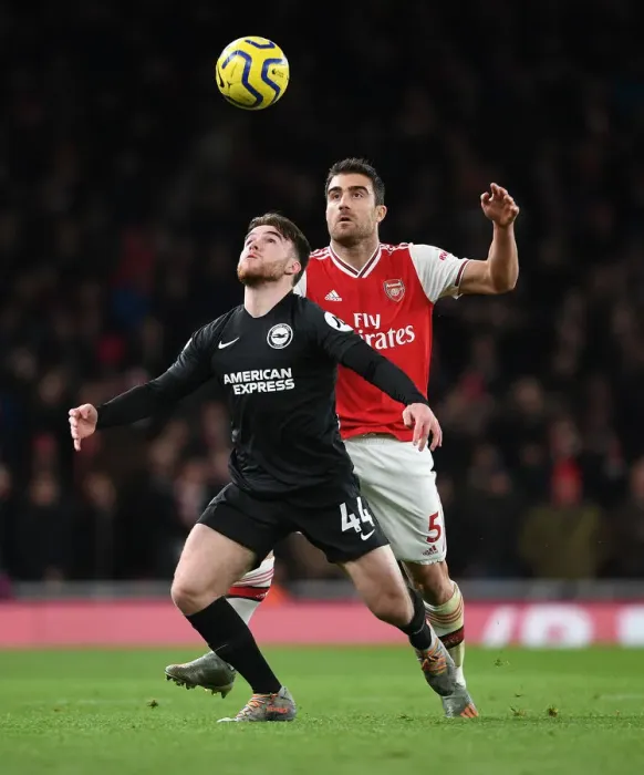 Framed Print : Intense Rivalry: Sokratis vs. Connelly - Arsenal's Fight Against Brighton