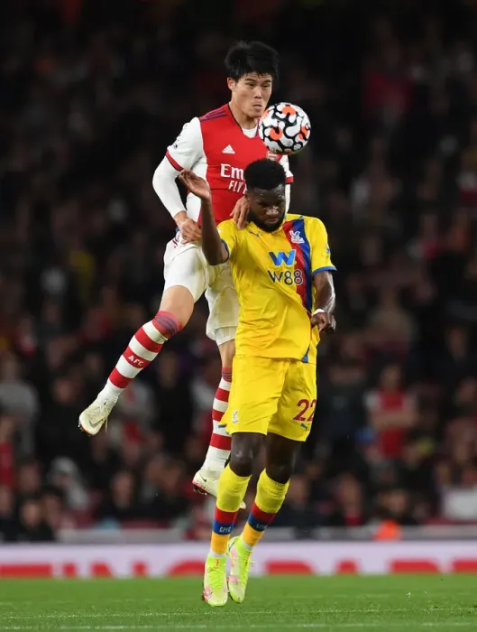 Framed Print : Intense Rivalry: Tomiyasu vs. Edouard Battle in Arsenal vs. Crystal Palace Premier League Clash (2021-22) Framed Print : Intense Rivalry: Tomiyasu vs. Edouard Battle in Arsenal vs. Crystal Palace Premier League Clash (2021-22)