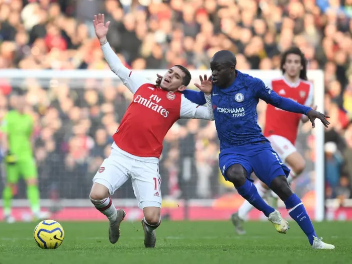 Framed Print : Intense Rivalry: Torreira Fouls Kante in Arsenal vs. Chelsea Clash (Premier League 2019-20) Framed Print : Intense Rivalry: Torreira Fouls Kante in Arsenal vs. Chelsea Clash (Premier League 2019-20)