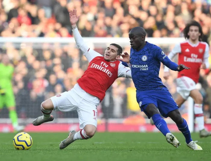 Framed Print : Intense Rivalry: Torreira Fouls Kante in Arsenal vs. Chelsea Clash (Premier League 2019-20)