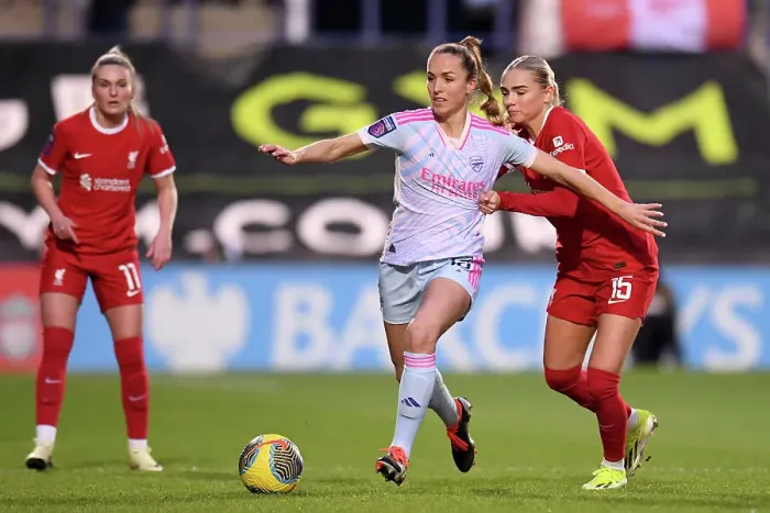 Framed Print : Intense Rivalry: Waelti vs. Lundgaard Battle in Liverpool Women vs. Arsenal Women's Super League Match Framed Print : Intense Rivalry: Waelti vs. Lundgaard Battle in Liverpool Women vs. Arsenal Women's Super League Match