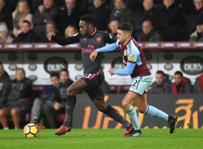 Framed Print : Intense Rivalry: Welbeck vs. Lowton in the Burnley vs. Arsenal Premier League Clash