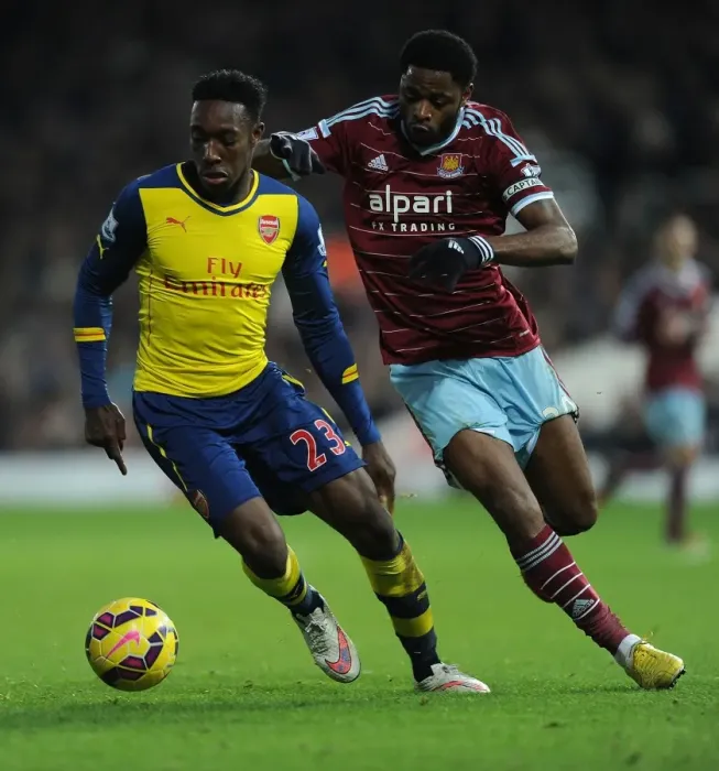 Framed Print : Intense Rivalry: Welbeck vs. Song Clash in West Ham United vs. Arsenal (2014-15)