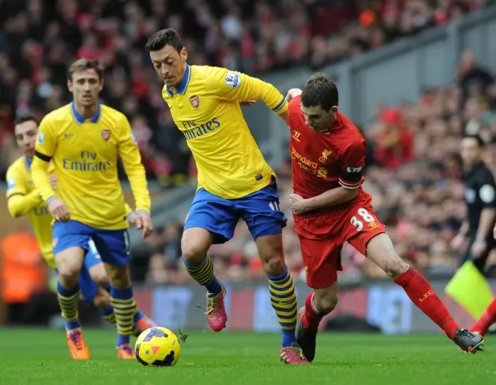 Framed Print : Intense Rivalry: Wilshere vs. Flanagan - Liverpool vs. Arsenal, Premier League 2013-14 Framed Print : Intense Rivalry: Wilshere vs. Flanagan - Liverpool vs. Arsenal, Premier League 2013-14