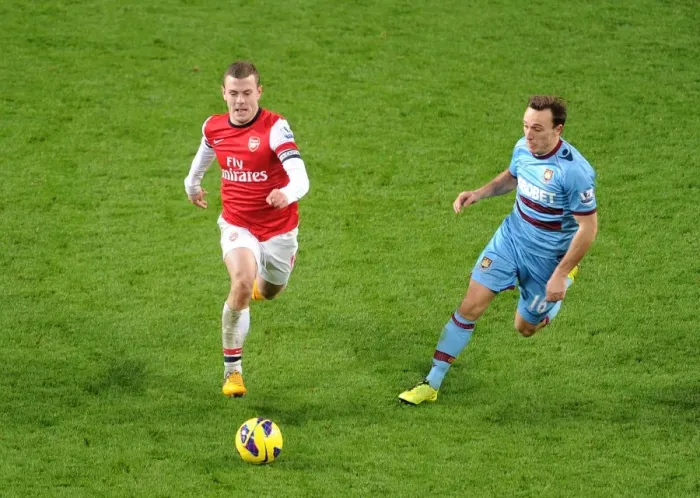 Framed Print : Intense Rivalry: Wilshere vs. Noble - Arsenal vs. West Ham Showdown Framed Print : Intense Rivalry: Wilshere vs. Noble - Arsenal vs. West Ham Showdown