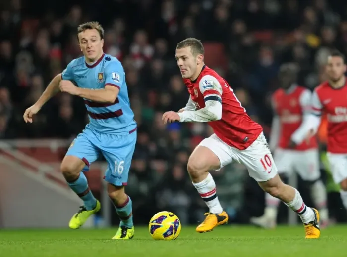 Framed Print : Intense Rivalry: Wilshere vs. Noble - Arsenal vs. West Ham Showdown