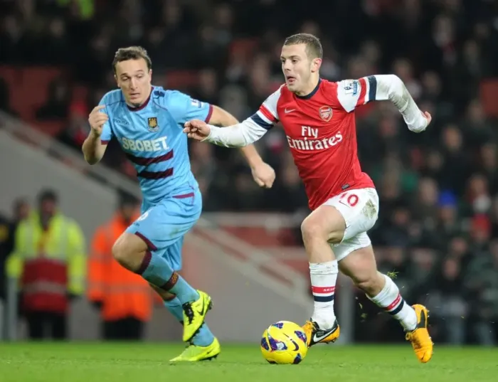 Framed Print : Intense Rivalry: Wilshere vs. Noble Clash in Arsenal vs. West Ham Showdown