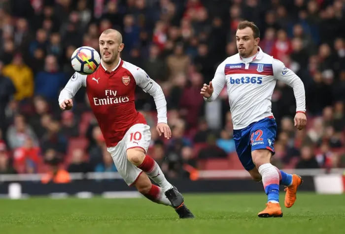 Framed Print : Intense Rivalry: Wilshere vs. Shaqiri - Arsenal's Battle Against Stoke Framed Print : Intense Rivalry: Wilshere vs. Shaqiri - Arsenal's Battle Against Stoke