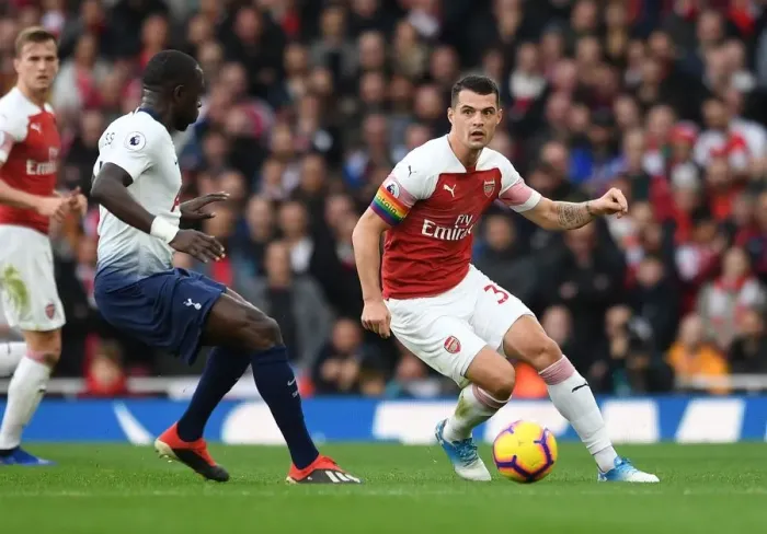 Framed Print : Intense Rivalry: Xhaka vs. Sissoko - Arsenal vs. Tottenham, Premier League 2018-19