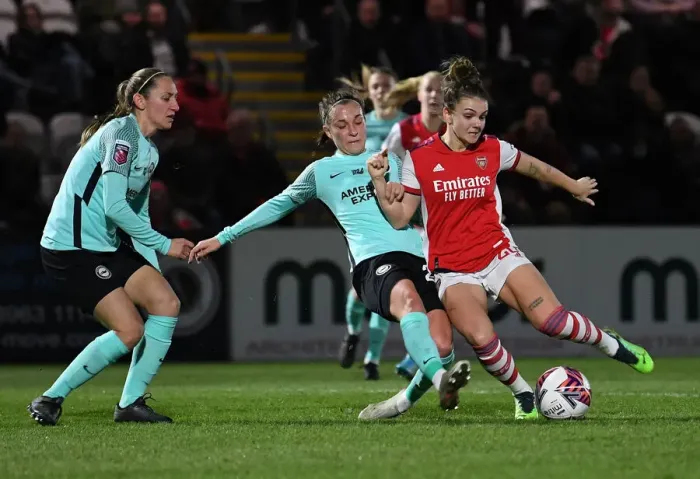 Framed Print : Intense Shooting Duel: Arsenal Women vs Brighton Hove Albion Women in FA WSL