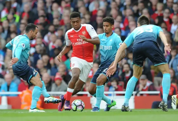 Framed Print : Intense Showdown: Iwobi vs Britton & Naughton - Arsenal vs Swansea, October 2016 Framed Print : Intense Showdown: Iwobi vs Britton & Naughton - Arsenal vs Swansea, October 2016