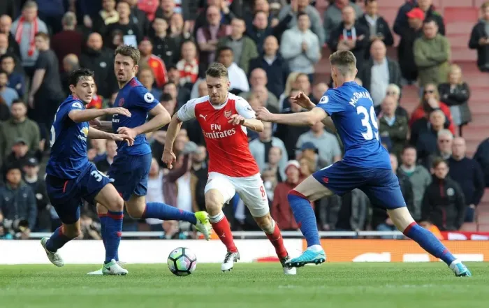 Framed Print : Intense Showdown: Ramsey vs. Darmian & McTominay (Arsenal vs. Manchester United, 2016-17)