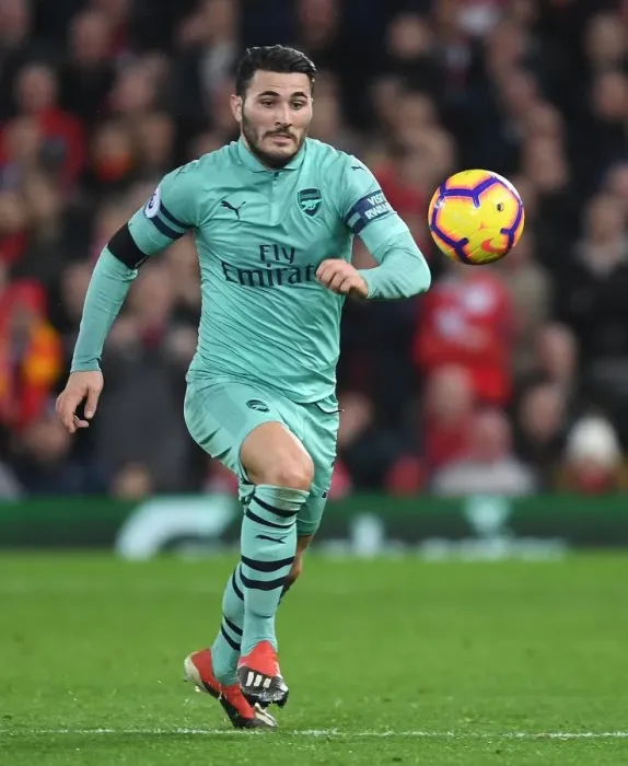 Framed Print : Intense Showdown: Sead Kolasinac vs. Liverpool in Premier League Clash