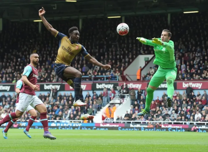Framed Print : Intense Showdown: Welbeck vs. Adrian - Arsenal's Attempt to Score Past West Ham's Goalkeeper Framed Print : Intense Showdown: Welbeck vs. Adrian - Arsenal's Attempt to Score Past West Ham's Goalkeeper