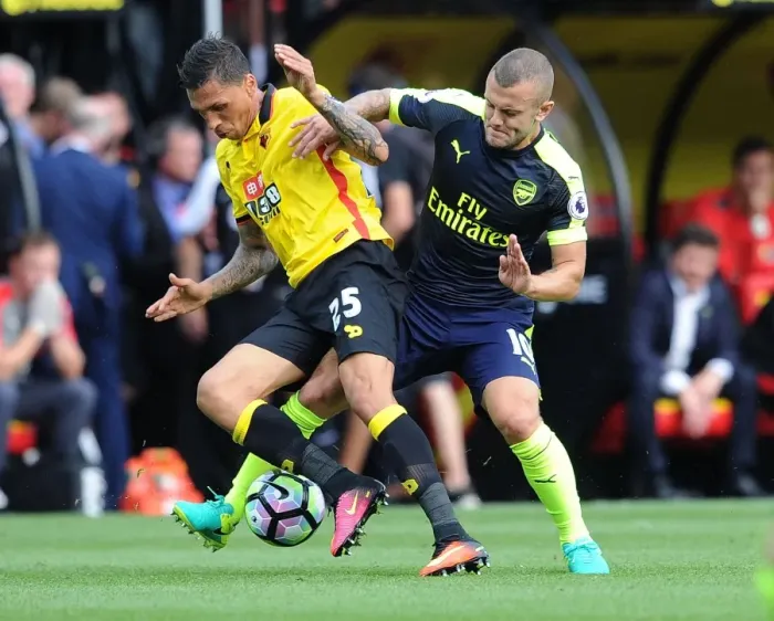 Framed Print : Intense: Wilshere's Crunching Tackle on Holebas Secures Arsenal's Victory (2016-17) Framed Print : Intense: Wilshere's Crunching Tackle on Holebas Secures Arsenal's Victory (2016-17)