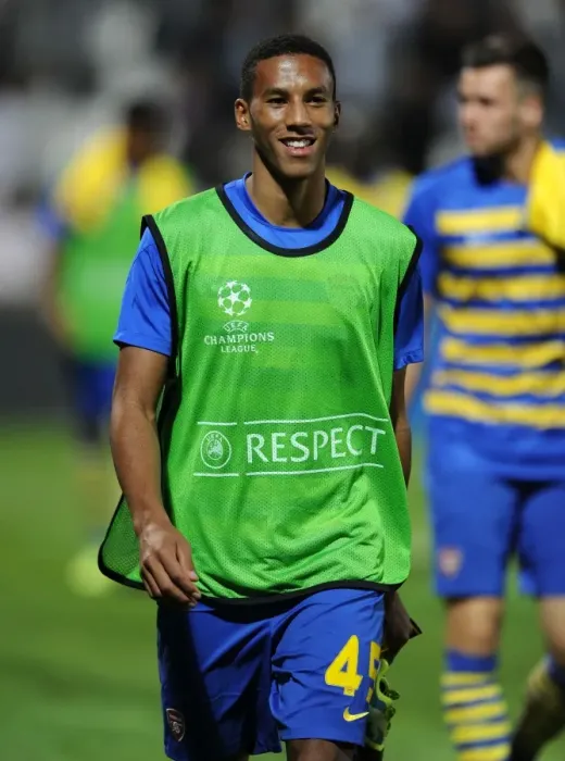 Framed Print : Isaac Hayden - Arsenal's Determination Amidst Marseille's Challenge (2013-14 Champions League)