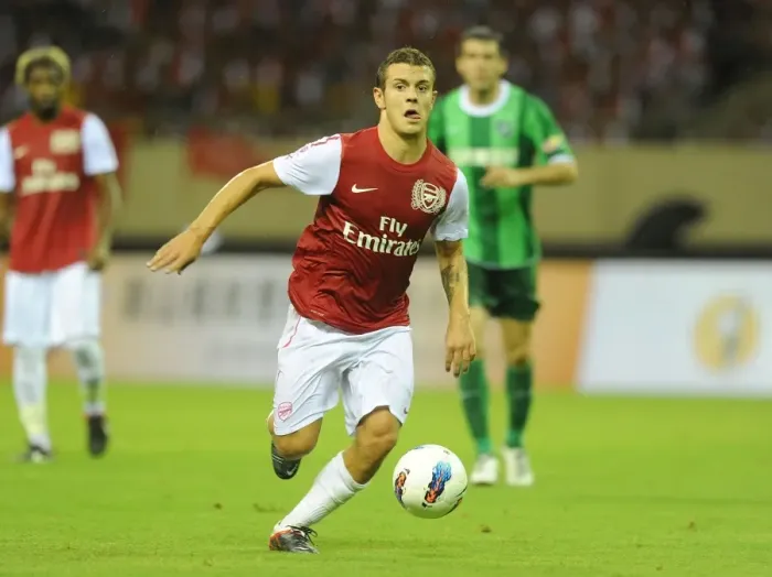 Framed Print : Jack Wilshere in Action: Arsenal's Star Midfielder Shines in Pre-Season Friendly against Hangzhou Greentown, China (2011) Framed Print : Jack Wilshere in Action: Arsenal's Star Midfielder Shines in Pre-Season Friendly against Hangzhou Greentown, China (2011)