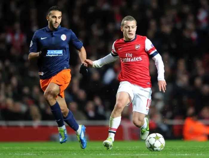 Framed Print : Jack Wilshere (Arsenal) Abdel El Kaoutari (Montpellier). Arsenal 2: 0 Montpellier Framed Print : Jack Wilshere (Arsenal) Abdel El Kaoutari (Montpellier). Arsenal 2: 0 Montpellier