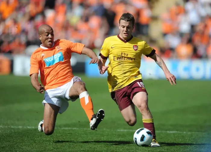 Framed Print : Jack Wilshere (Arsenal) Alex Baptiste (Blackpool). Blackpool 1: 3 Arsenal