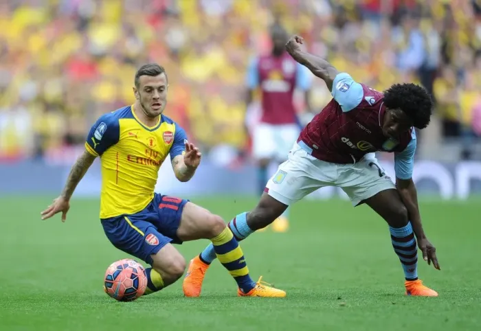 Framed Print : Jack Wilshere (Arsenal) Carlos Sanchez (Villa). Arsenal 4: 0 Aston Villa. FA Cup Final