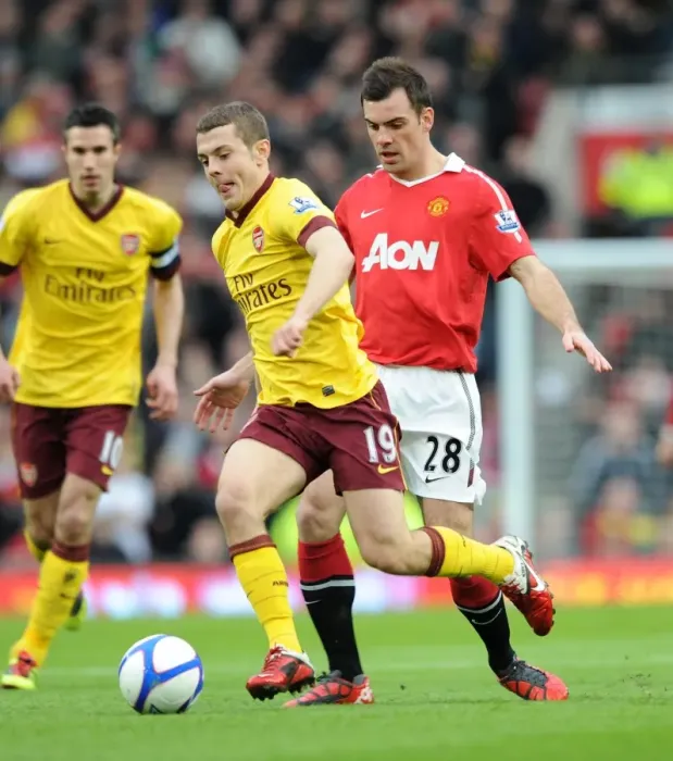 Framed Print : Jack Wilshere (Arsenal) Darron Gibson (Man Utd). Manchester United 2: 0 Arsenal
