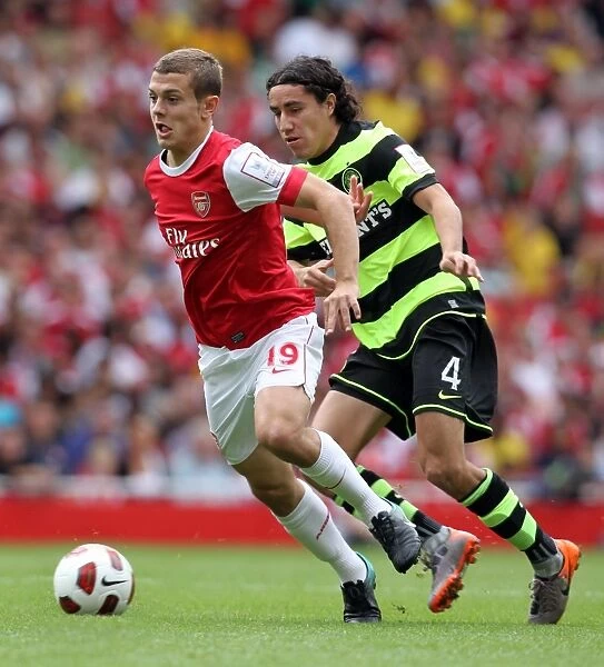 Jack Wilshere (Arsenal) Efrain Juarez (Celtic). Arsenal 3: 2 Celtic. Emirates Cup Pre Season