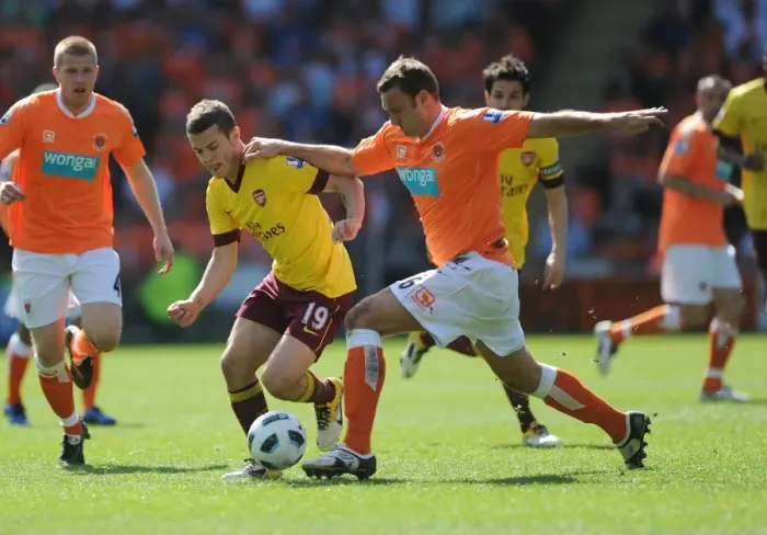 Framed Print : Jack Wilshere (Arsenal) Ian Evatt (Blackpool). Blackpool 1: 3 Arsenal, Barclays Premier League Framed Print : Jack Wilshere (Arsenal) Ian Evatt (Blackpool). Blackpool 1: 3 Arsenal, Barclays Premier League
