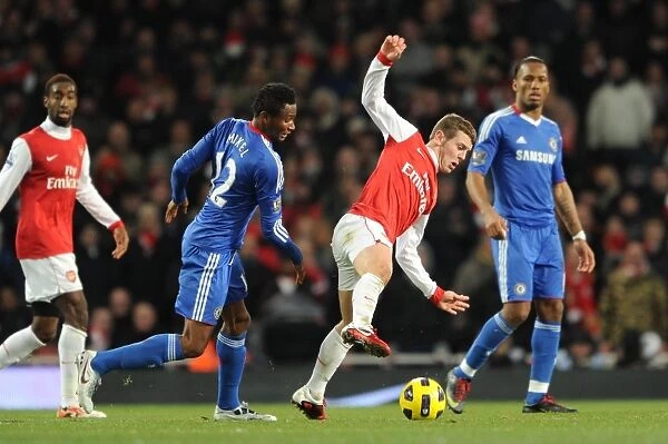 Jack Wilshere (Arsenal) John Obi Mikel (Chelsea). Arsenal 3: 1 Chelsea. Barclays Premier League