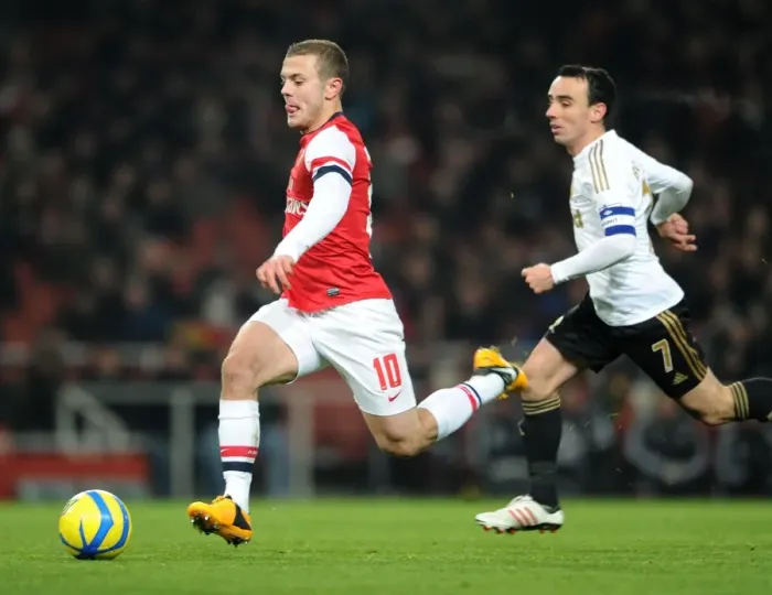 Framed Print : Jack Wilshere (Arsenal) Leon Britton (Swansea). Arsenal 1: 0 Swansea City. FA Cup 3rd Round replay