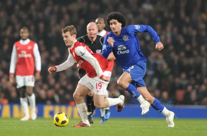 Framed Print : Jack Wilshere (Arsenal) Marouane Fellaini (Everton). Arsenal 2: 1 Everton