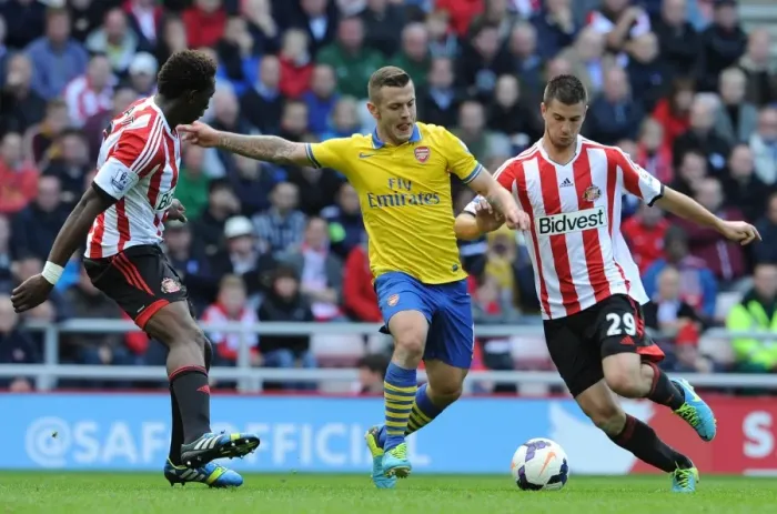 Framed Print : Jack Wilshere (Arsenal) Modibo Diakite and Valentin Roberge (Sunderland). Sunderland 1: 3 Arsenal
