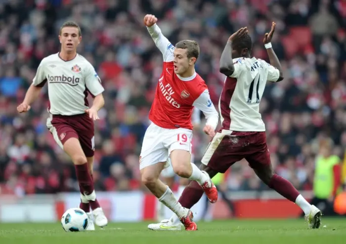 Framed Print : Jack Wilshere (Arsenal) Sulley Muntari (Sunderland). Arsenal 0: 0 Sunderland