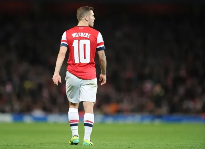 Framed Print : Jack Wilshere: Arsenal's Midfield Maestro Shines in UEFA Champions League Clash vs Borussia Dortmund (2013)