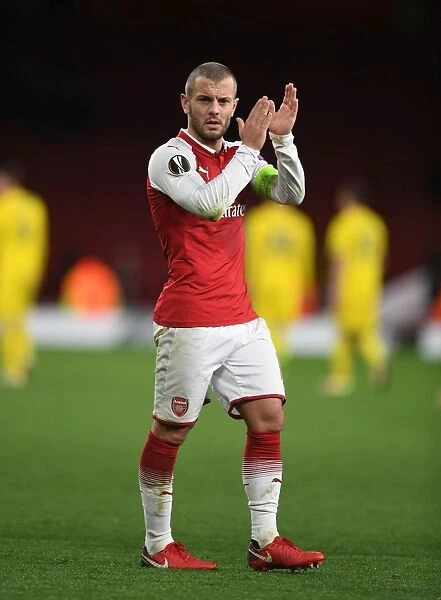 Jack Wilshere Celebrates with Arsenal Fans after Europa League Victory over BATE Borisov