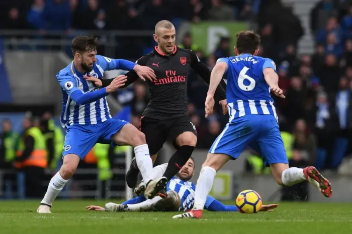 Framed Print : Jack Wilshere Clashes with Brighton Trio in Intense Arsenal Battle Framed Print : Jack Wilshere Clashes with Brighton Trio in Intense Arsenal Battle